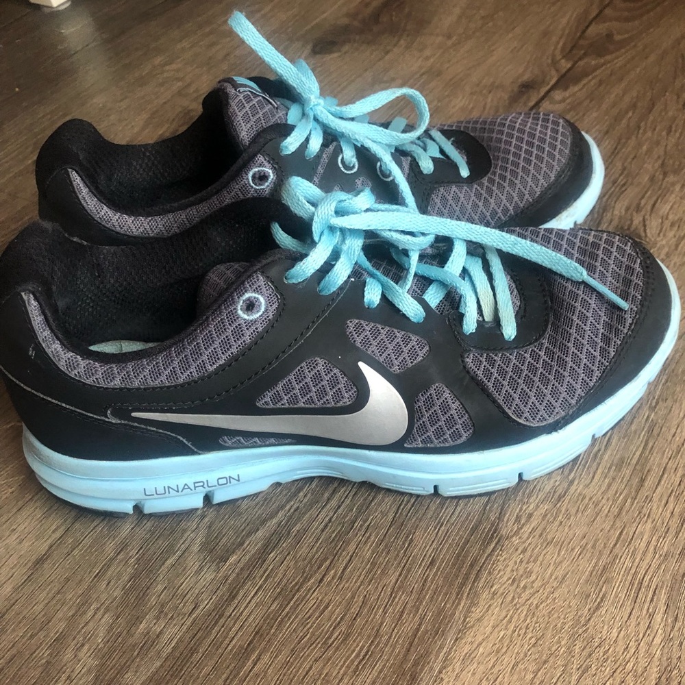 Blue and black Nike shoes size 6.5Y (bought them for myself I am 7.5 in women’s)